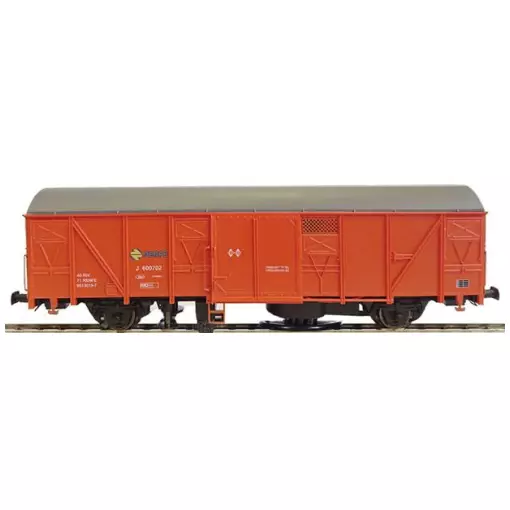 Brown boxcar with track cleaning axles, polished and vacuumed