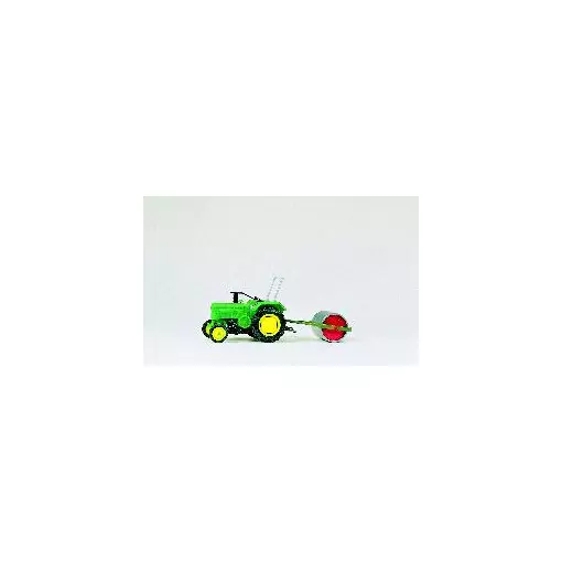 Agricultural tractor with roller