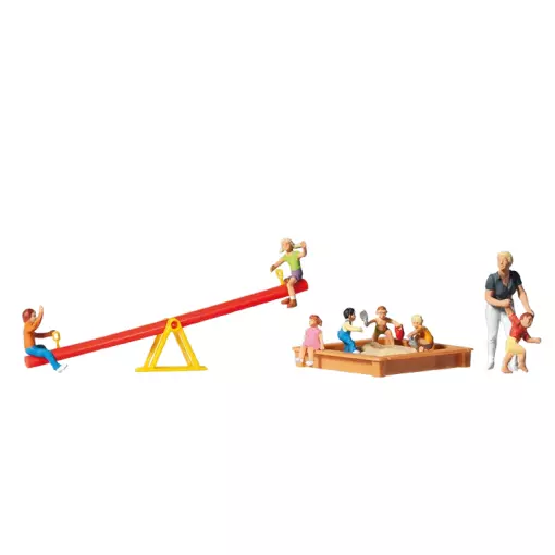 Children playing with sandpit and swing