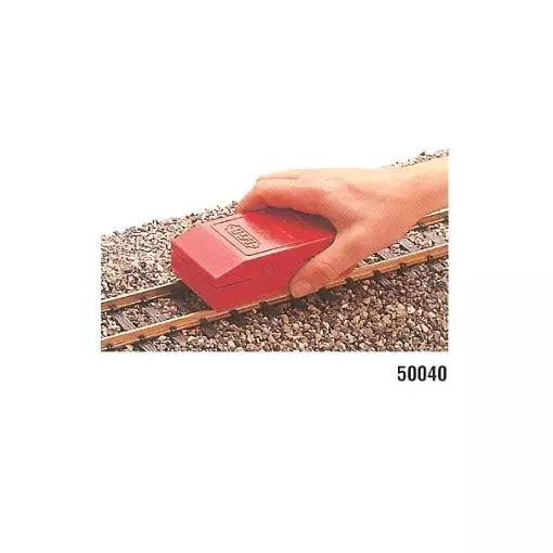 Cleaning block for rails
