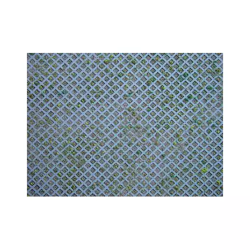 Diamond-shaped perforated brick wall plate with grass