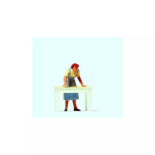 Housewife wiping the table