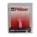 Woman styling her hair with hairspray PREISER 28229 - HO 1:87
