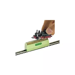 Cleaning brush for locomotive wheels