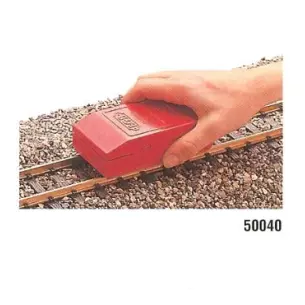 Cleaning block for rails