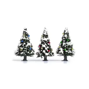 Three snow-covered Christmas trees