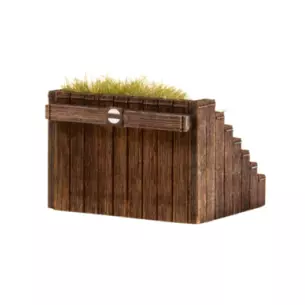Wooden knocker with grass