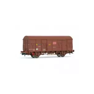 Covered freight car with brown delivery