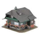 Modèle anniversaire de la maison de la Forêt-Noire avec figurine - Faller 130010 - HO 1/87