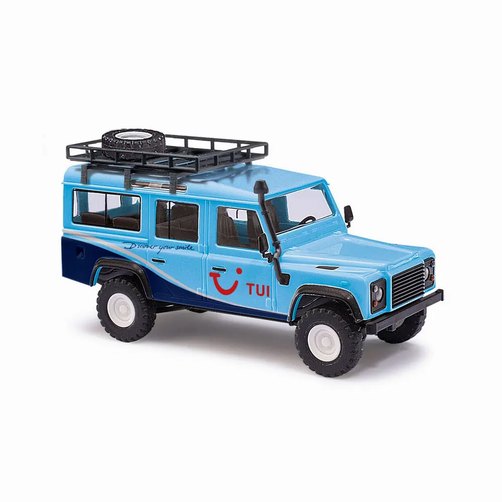 Land Rover Defender, TUI avec porte-bagages et valise  - Busch 50334 - HO 1/87