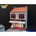 Mini-façade avec café‑restaurant + couple de restaurateurs - Régions et compagnies FAC037 - HO 1/87