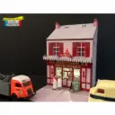 Mini-façade avec boucherie + couple de bouchers -Régions et compagnies FAC033 - HO 1/87