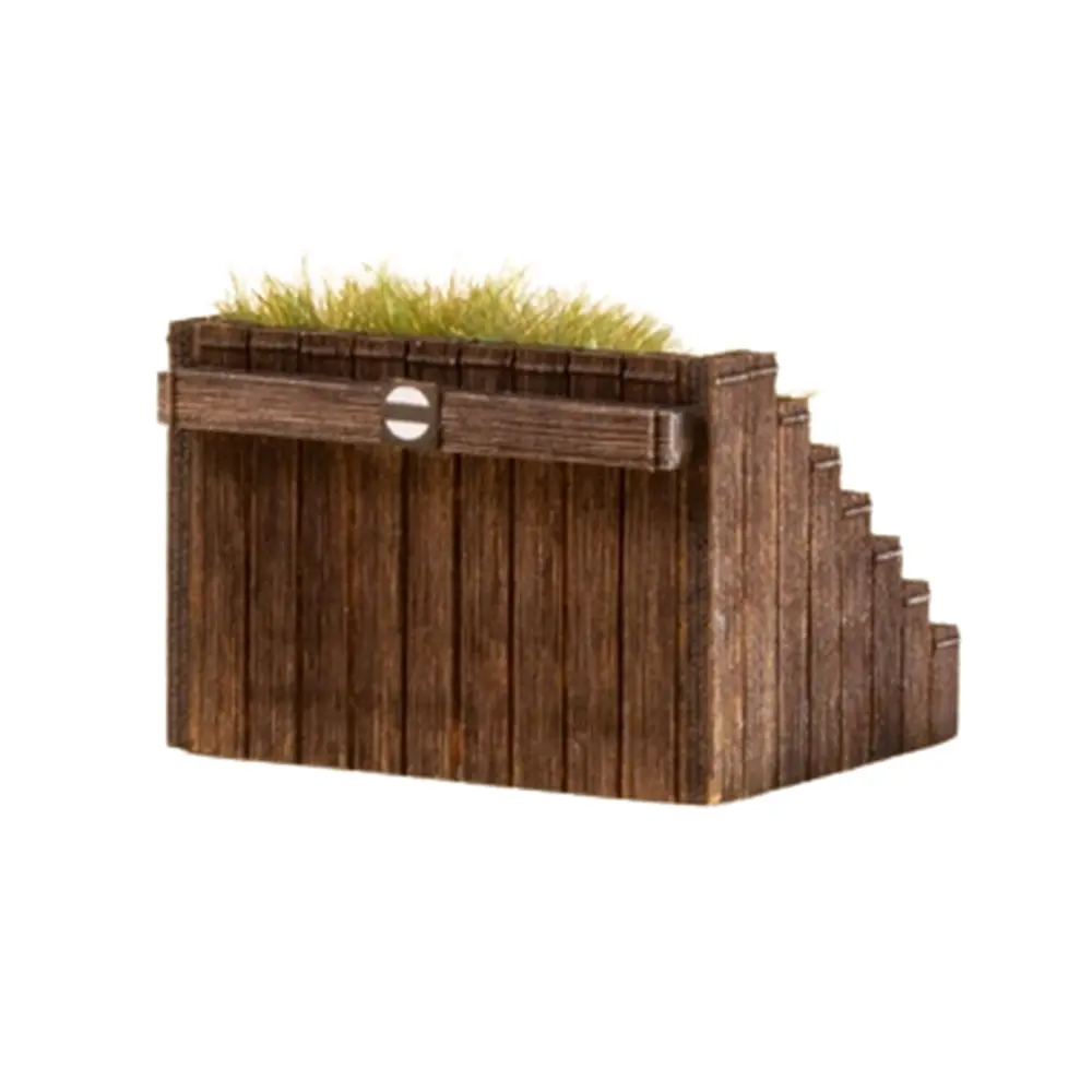 Heurtoir en bois avec herbe