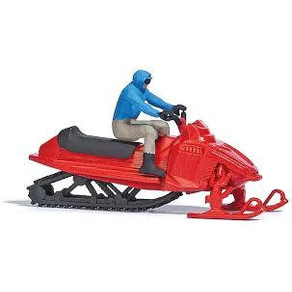Scooter des neiges / motoneige rouge avec conducteur BUSCH 7818 HO 1/87