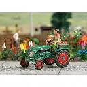 Tracteur Kramer KL 11 avec agriculteur et enfant