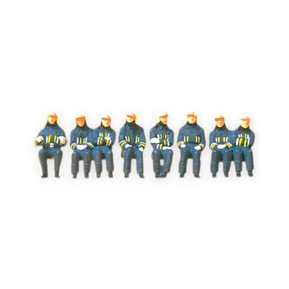 Equipe de pompiers assis, conducteur