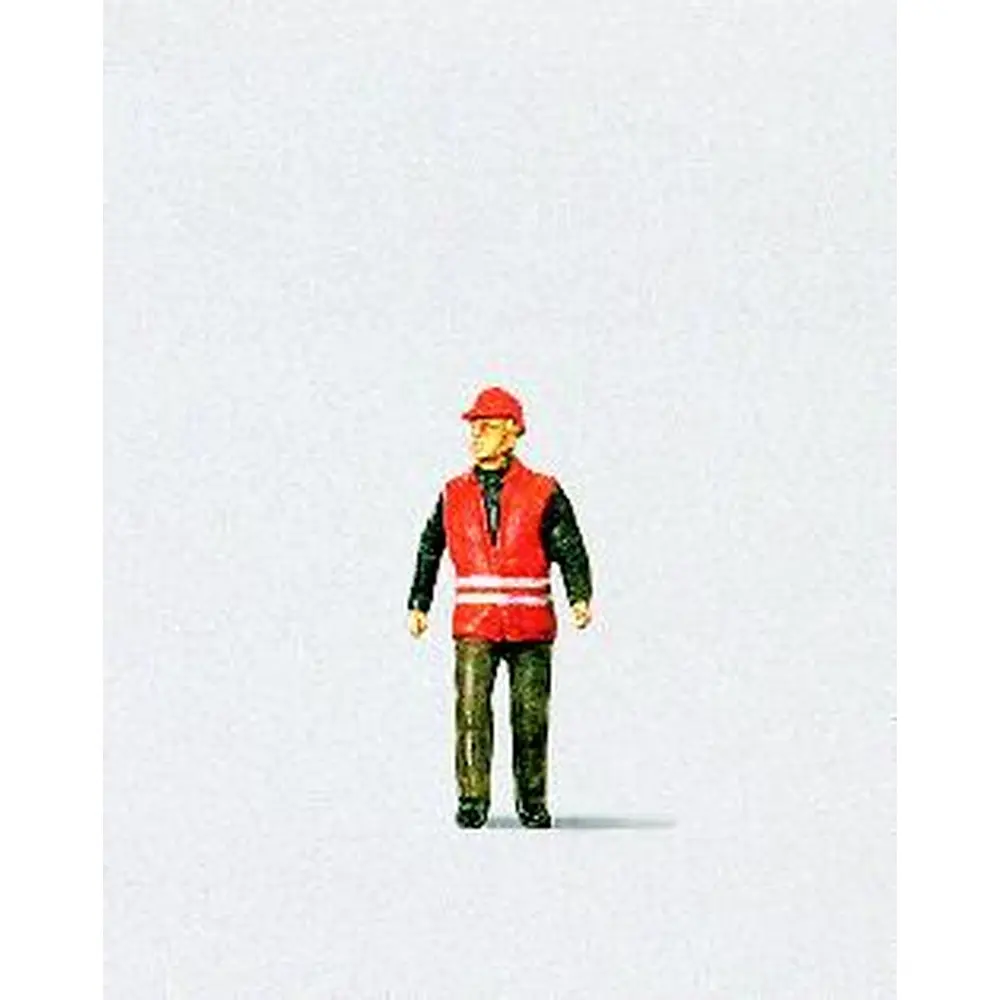 Employé des chemins de fer portant une veste de sécurité