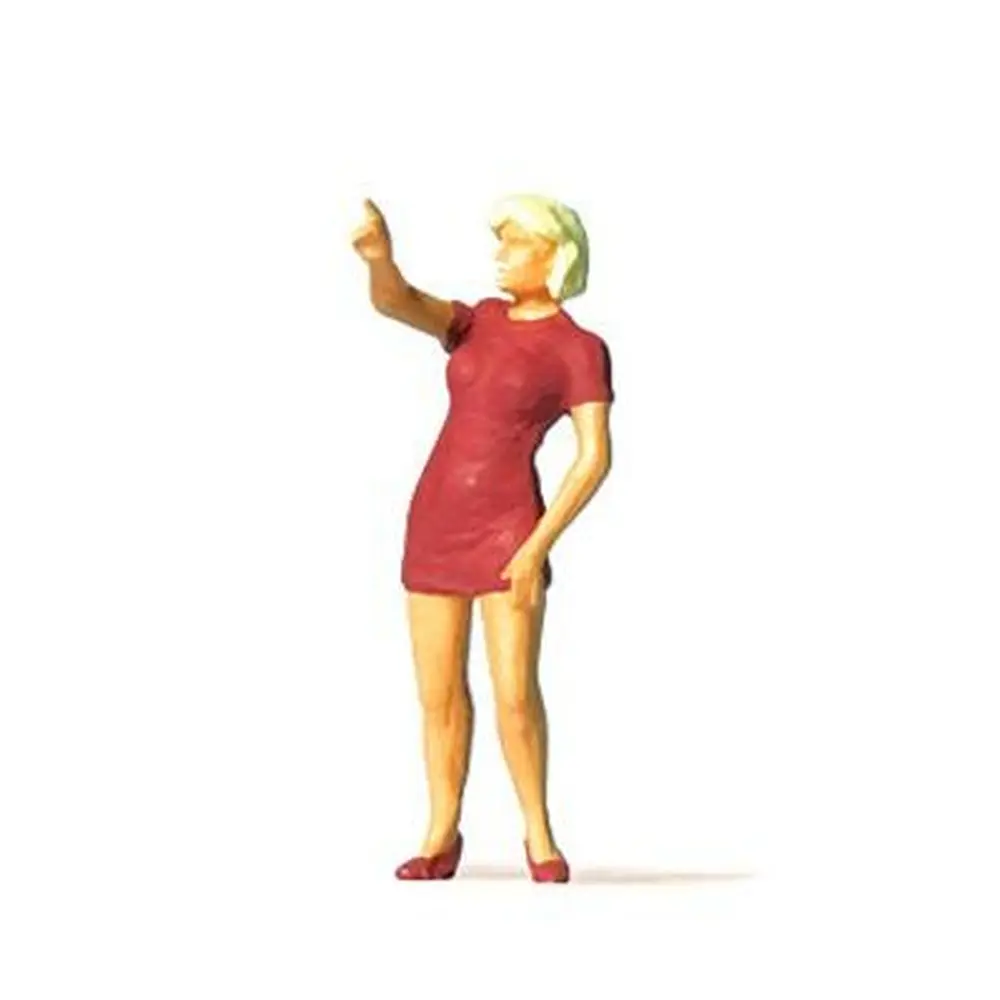 Femme en robe pointant son doigt PREISER 28190 - HO 1:87